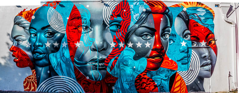 Wide mural panorama — street art gallery under open sky